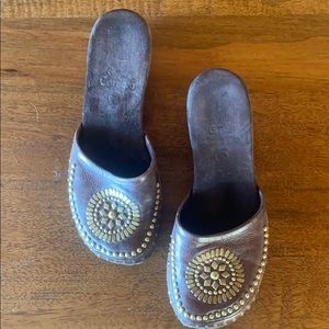 Brown resoled clogs